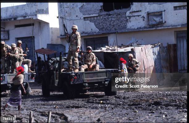 Marines search for weapons and ammunition January 11, 1993 in Mogadishu, Somalia. The United Nations hopes to restore order and save hundreds of...