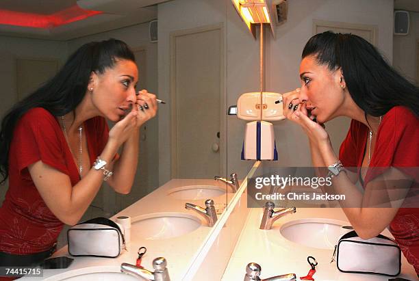 Clubber does her makeup in the restrooms of Pacha nightclub in Eivissa town on June 5, 2007 in Ibiza, Spain. Pacha will celebrate its 34th birthday...