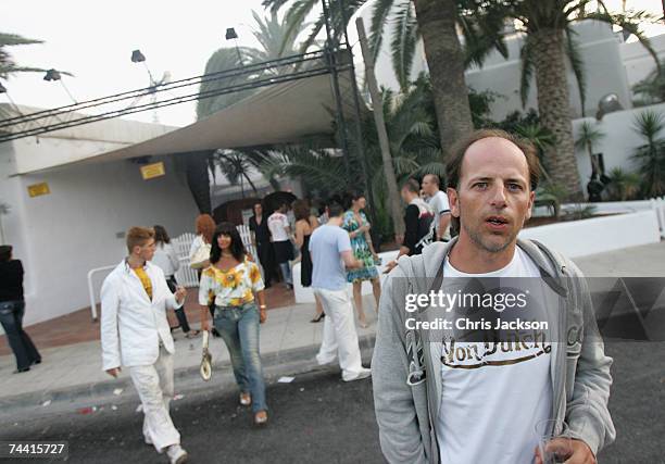 Clubbers walk out into the daylight at 7:30am after a night out at Pacha nightclub in Eivissa town on June 5, 2007 in Ibiza, Spain. Pacha will...