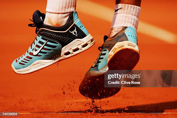 Detailed view as Rafael Nadal of Spain serves to Carlos Moya of Spain during the Men's Singles Quarter Final match on day eleven of the French Open...