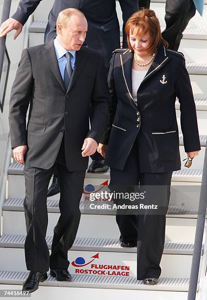 Russian President Vladimir Putin and his wife Ludmila Alexandrowna Putina arrive for the G8 summit June 6, 2007 in Rostock-Laage, Germany. Putin and...