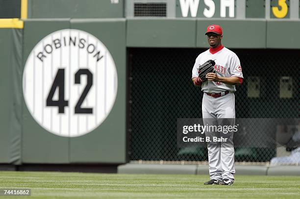 Right fielder Ken Griffey Jr. #3 of the Cincinnati Reds covers right field against the Colorado Rockies in the fourth inning on June 3, 2007 at Coors...