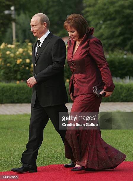 Russian President Vladimir Putin and his wife Lyudmila Putina arrive at the opening dinner of the G8 summit at Heiligendamm June 6, 2007 at Hohen...