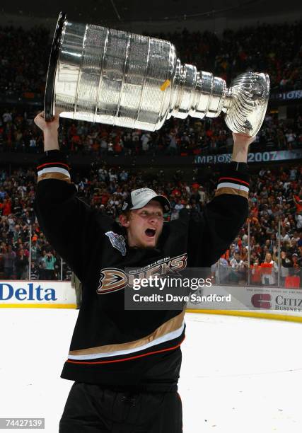 Corey Perry of the Anaheim Ducks celebrates with the Stanley Cup after defeating the Ottawa Senators in Game Five of the 2007 Stanley Cup finals on...