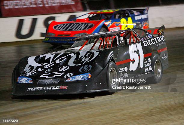 Kyle Bush leads Jeff Gordon during the Nextel Prelude to the Dream on June 6, 2007 at Eldora Speedway in New Weston, Ohio.