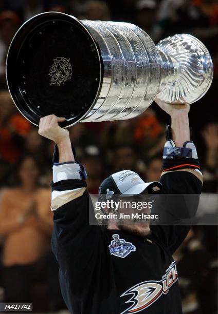 Teemu Selanne of the Anaheim Ducks hoists the Stanley Cup after his team's victory over the Ottawa Senators 6-2 during Game Five of the n June 6,...