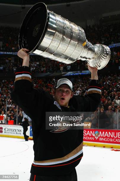 Corey Perry of the Anaheim Ducks celebrates lifting the Stanley Cup after defeating the Ottawa Senators in Game Five of the 2007 Stanley Cup finals...