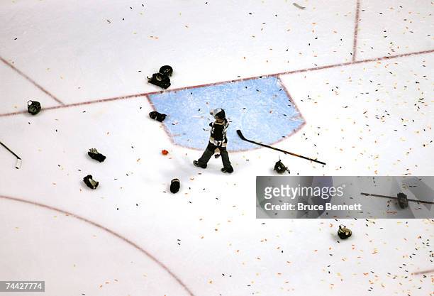 Scott Niedermayer of the Anaheim Ducks son walks across the ice after the Ducks victory over the Ottawa Senators 6-2 during Game Five of the Stanley...