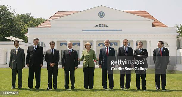 Japanese Prime Minister Shinzo Abe, Canadian Prime Minister Stephen Harper, French President Nicolas Sarkozy, Russian President Vladimir Putin,...