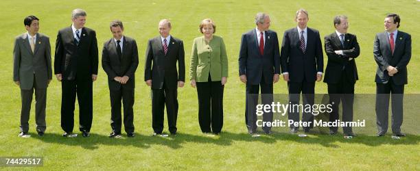 World leaders: Japanese Prime Minister Shinzo Abe, Canadian Prime Minister Stephen Harper, French President Nicolas Sarkozy, Russian President...