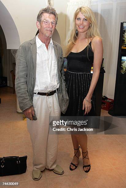 John Hurt and Meredith Ostrom attend a party at the Hotel Hacienda on June 7, 2007 in Ibiza, Spain. The Inaugural Ibiza and Formentera International...