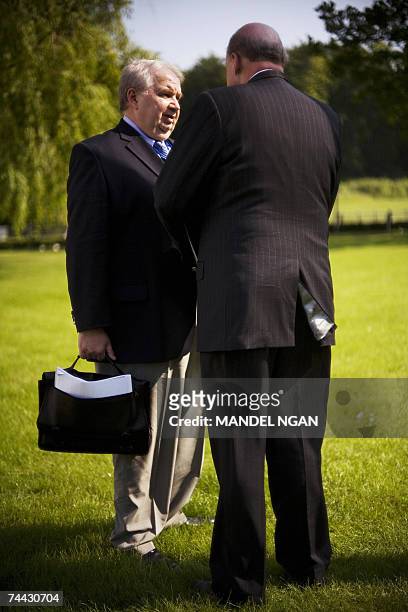 Russian Deputy Foreign Minister Sergei Kislyak speaks with US Deputy Secretary of State John Negroponte after US President George W. Bush and Russian...