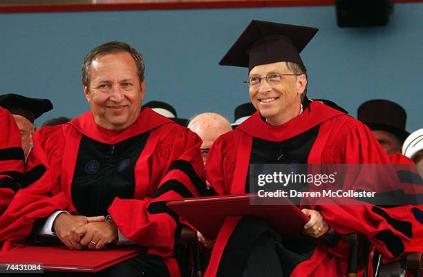 Microsoft co-founder and Chairman Bill Gates and former Harvard University Presiden Larry Summers sit on stage during commencement ceremonies at...