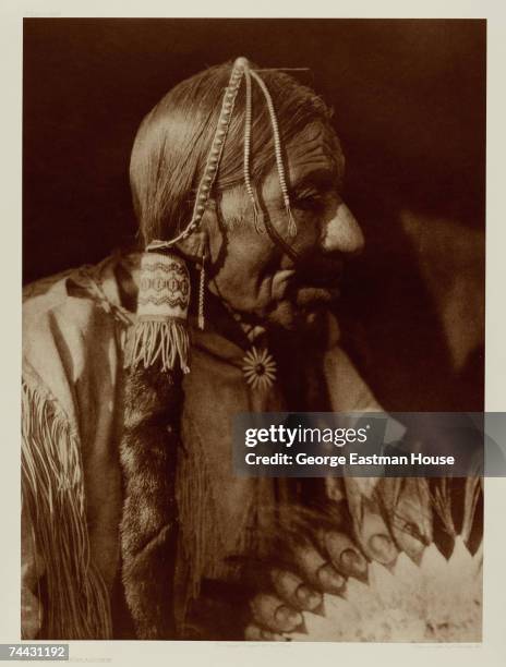 Profile portrait originally titled 'Esipermi - Comanche,' early 1900s.