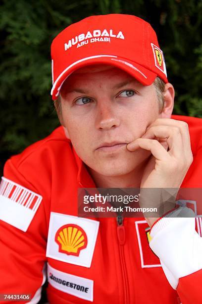 Kimi Raikkonen of Finland and Ferrari looks on in the paddock during previews prior to the Canadian Formula One Grand Prix at the Gilles-Villeneuve...