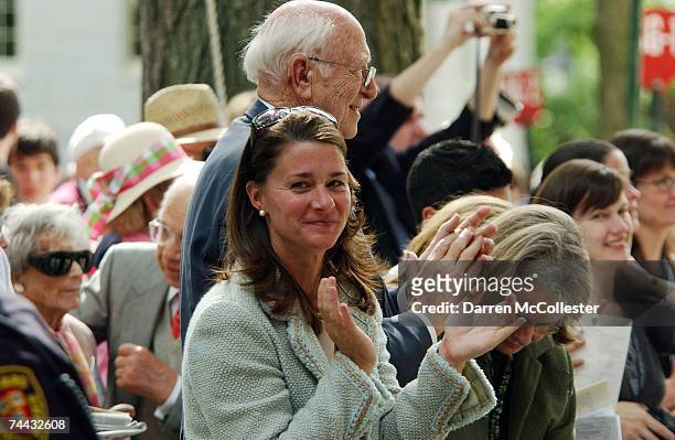 Melinda Gates and Bill Gates Sr., applaud as Microsoft co-founder and Chairman Bill Gates, gives the commencement speech at Harvard University June...