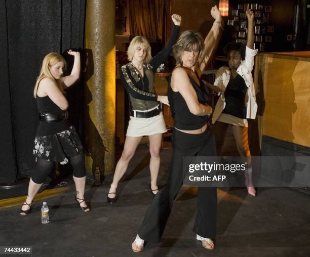 Women of Dance EroTeknique put on a Pole Dancing demonstration at The Ballroom 11 May 2007 in Montreal, Canada. From left are: Wendy Iadeluca , Jamie...