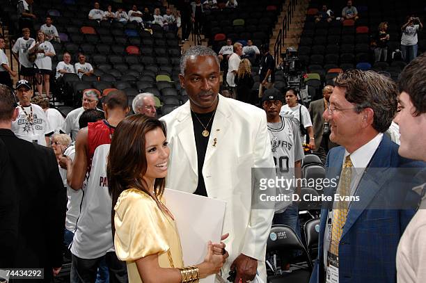 Actress Eva Longoria stands next to Tony Parker's dad, Tony Parker Senior, before the San Antonio Spurs play the Cleveland Cavaliers in Game One of...