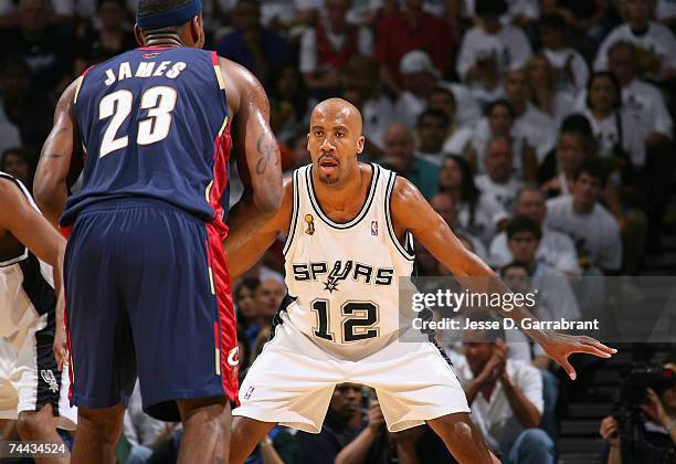 Bruce Bowen of the San Antonio Spurs defends against LeBron James of the Cleveland Cavaliers in Game One of the NBA Finals at the AT&T Center on June...