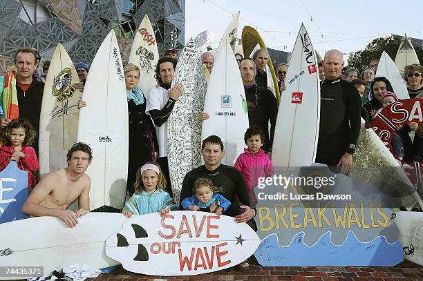 Surfrider Foundation Australia protesters pose for a photo before the Surfrider Foundation Australia march from Federation Square to Parliament House...