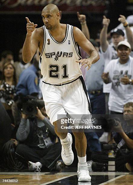 San Antonio, UNITED STATES: Tim Duncan of the San Antonio Spurs celebrates after making a basket against the Cleveland Cavaliers 07 June 2007 during...