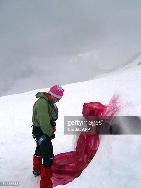 Chamonix-Mont-Blanc, FRANCE: Marco Evaristti, a Danish artist who planned to paint the peak of Mont Blanc red in a bid to raise awareness of...