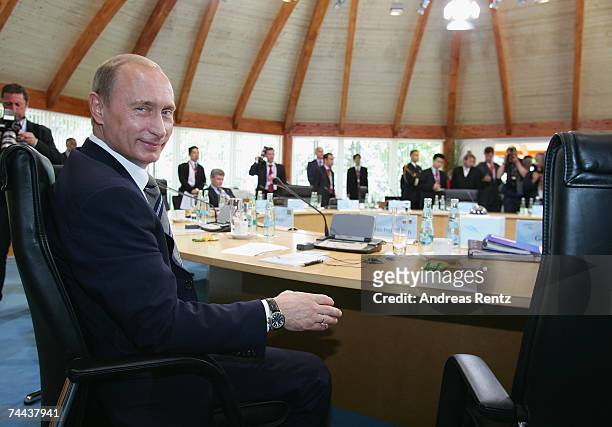 Russian President Wladimir Putin looks on prior to a working session of the G8 leaders and five top developing and African nations on June 8, 2007 in...