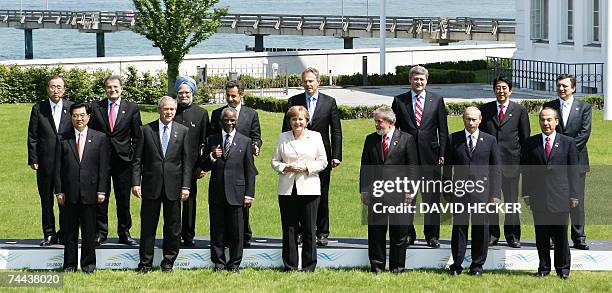 Heads of State and representatives of the top five developing nations pose for a family picture 08 June 2007 at the G8 summit in Heiligendamm,...