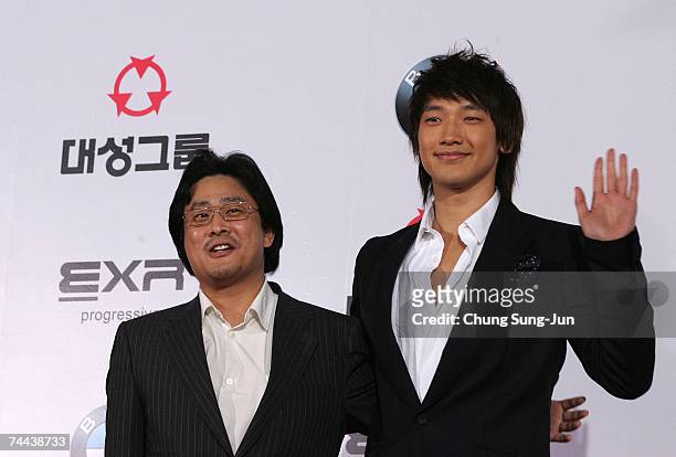South Korean actor and singer Rain and director Park Chan-Wook arrives for the 44th DaeSong Film Awards at the SeJong culture center June 8, 2007 in...