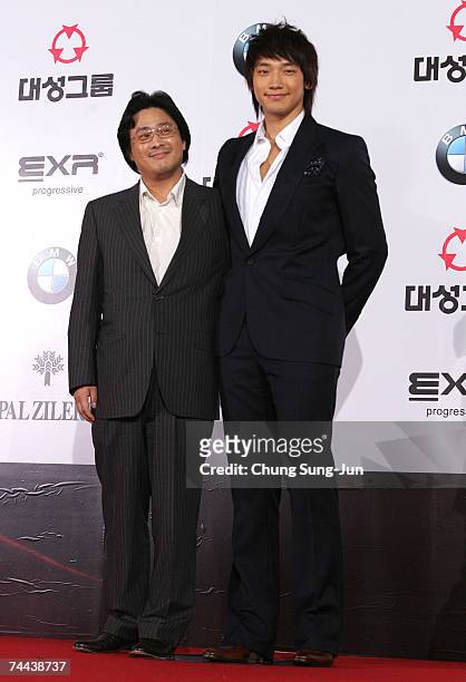 South Korean actor and singer Rain and director Park Chan-Wook arrives for the 44th DaeSong Film Awards at the SeJong culture center June 8, 2007 in...
