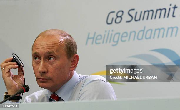 Russian President Vladimir Putin gives a press conference 08 June 2007 in Heiligendamm on the results of the Group of Eight summit held there from 06...