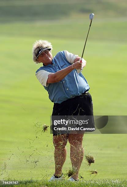 Laura Davies of England hits from the rough for her second shot at the par 4, 1st hole during the second round of the 2007 McDonald's LPGA...