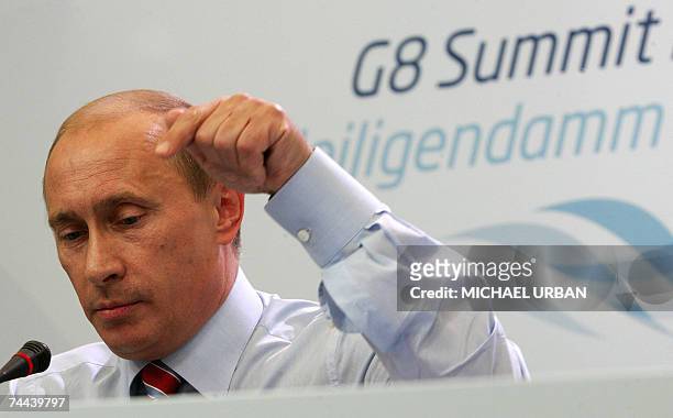Russian President Vladimir Putin gives a press conference 08 June 2007 in Heiligendamm on the results of the Group of Eight summit held there from 06...