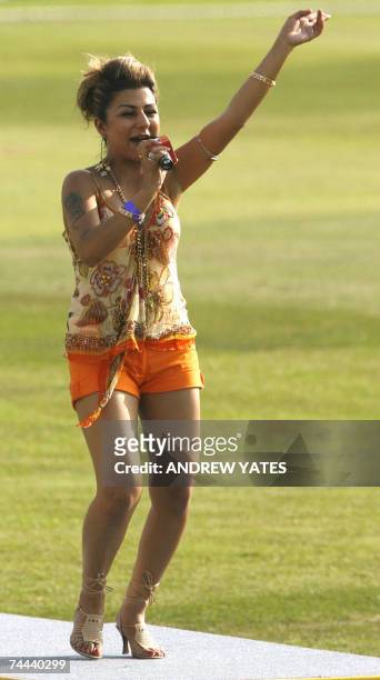 Leeds, UNITED KINGDOM: Pop singer Hardcore performs at a celebrity cricket match at Headingley Cricket ground 08 June 2007, during the International...