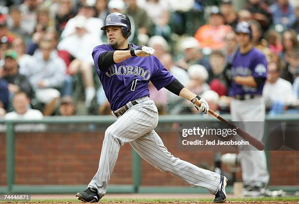 Jamey Carroll of the Colorado Rockies swings at the pitch against the San Francisco Giants during a Major League Baseball game on May 27, 2007 at...