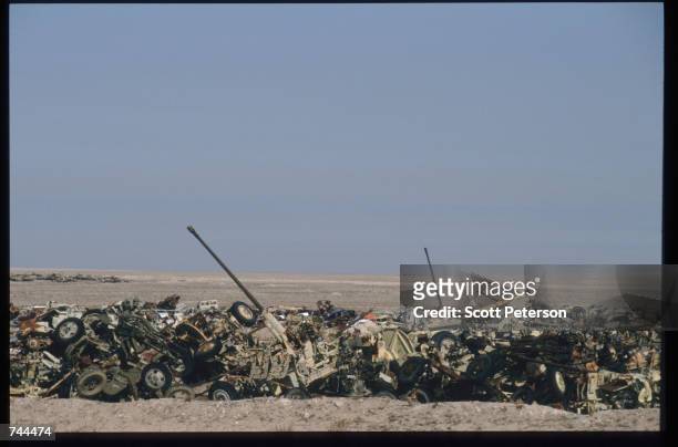 Abandoned Iraqi military equipment sits rusting in the desert December 20, 1996 in Kuwait. As part of the Defense Cooperation Agreement signed by the...