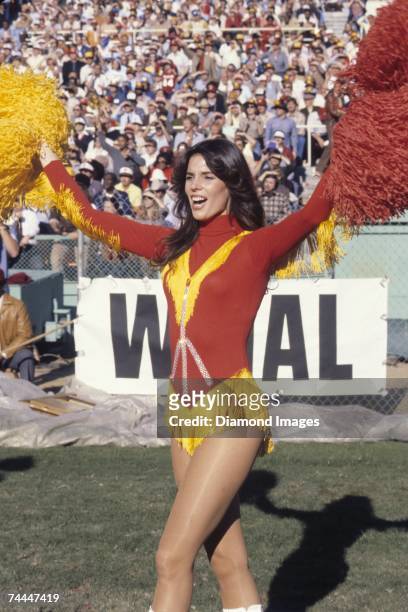 Redskinette cheerleader for the Washington Redskins cheers on the Redskins during a game in November, 1979 at RFK Stadium in Washington, DC.