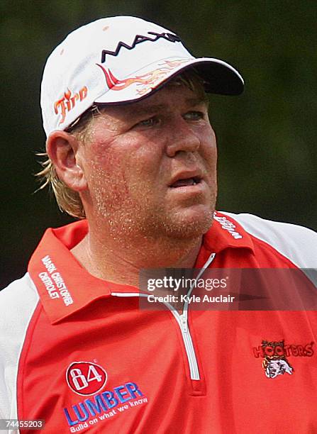 John Daly watches his tee shot on the eighth hole during the second round of the Stanford St. Jude Championship at the TPC Southwind on June 8, 2007...