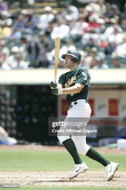 Bobby Crosby of the Oakland Athletics hits during the game against the Kansas City Royals at the McAfee Coliseum in Oakland, California on May 17,...