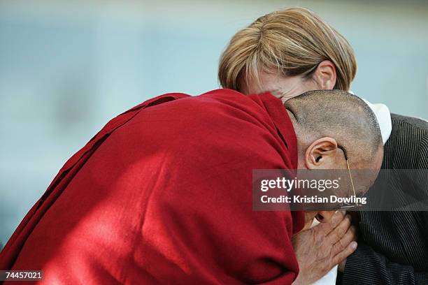 Actress Kerry Armstrong receives a blessing from the Dalai Lama during a free public talk about Universal Responsibility at MC Labour Park June 9,...