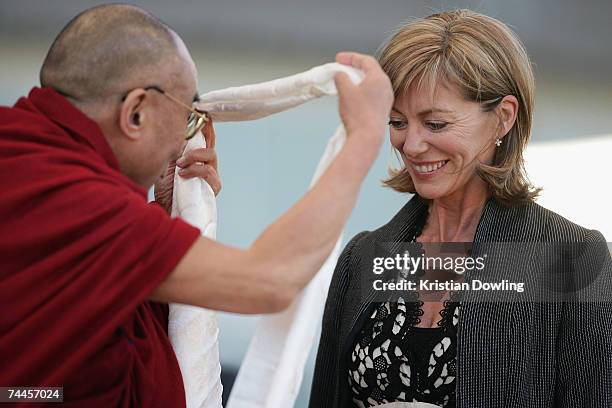Actress Kerry Armstrong receives a blessing from the Dalai Lama during a free public talk about Universal Responsibility at MC Labour Park June 9,...