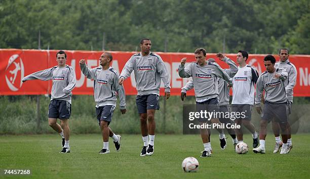 Mark Noble and Anton Ferdinand of England in action during an England U21 training session at the Sportpark Ressenon June 9, 2007 in Bemmel,...