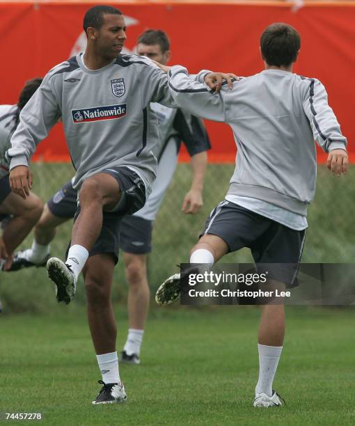 Anton Ferdinand and Mark Noble of England warm up during an England U21 training session at the Sportpark Ressen on June 9, 2007 in Bemmel,...