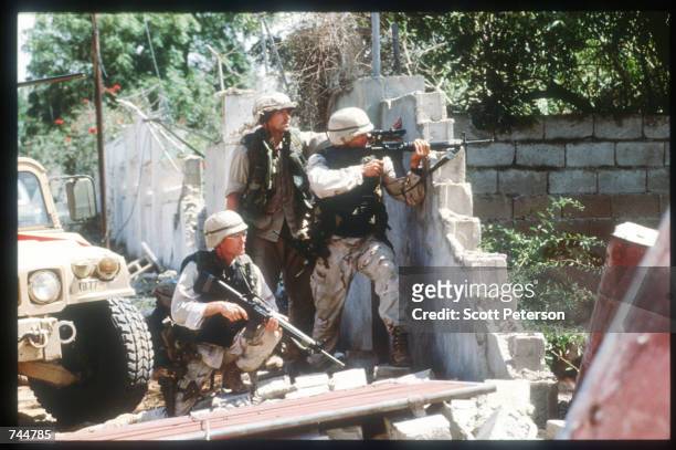 United Nations troops aim guns while on a peacekeeping mission June 20, 1993 in Mogadishu, Somalia. An estimated 350,000 Somalis died due to war,...