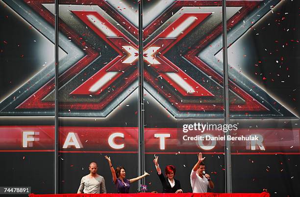 Judges for the new X Factor series 4 Brian Friedman, Dannii Minogue, Sharon Osbourne and Simon Cowell wave to the crowd during the first day of...