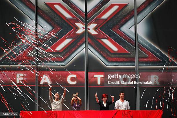 Judges for the new X Factor series 4 Brian Friedman, Dannii Minogue, Sharon Osbourne and Simon Cowell wave to the crowd during the first day of...
