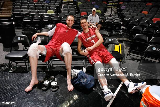 Zydrunas Ilgauskas and Sasha Pavlovic of the Cleveland Cavliers pose for a photo at practice an off day between Games 1 and 2 of the NBA Finals at...