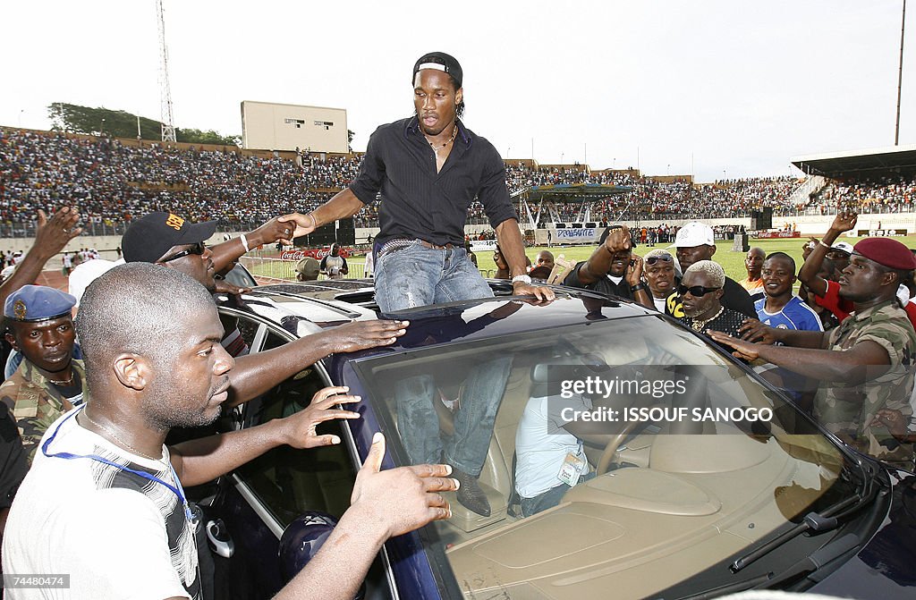 Ivorian football star Didier Drogba, doe...