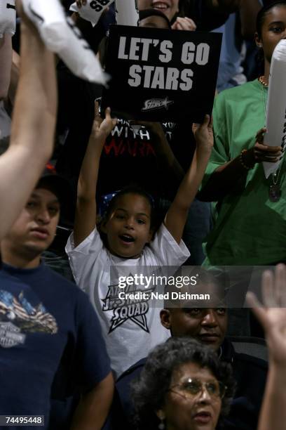 Fan of the San Antonio Silver Stars cheers against the Chicago Sky at the AT&T Center June 9, 2007 in San Antonio, Texas. NOTE TO USER: User...