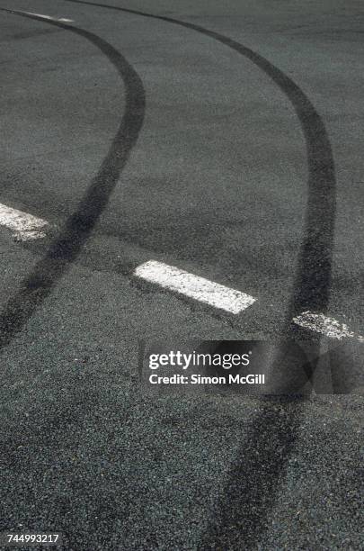 monochromatic color - skid marks accident stock pictures, royalty-free photos & images